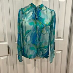 APNY long sleeve multi color summer top. String tie at neck.